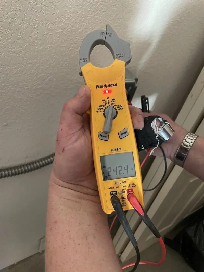 Voltage testing with clamp meter during Recessed Lighting Installation in Sun City West